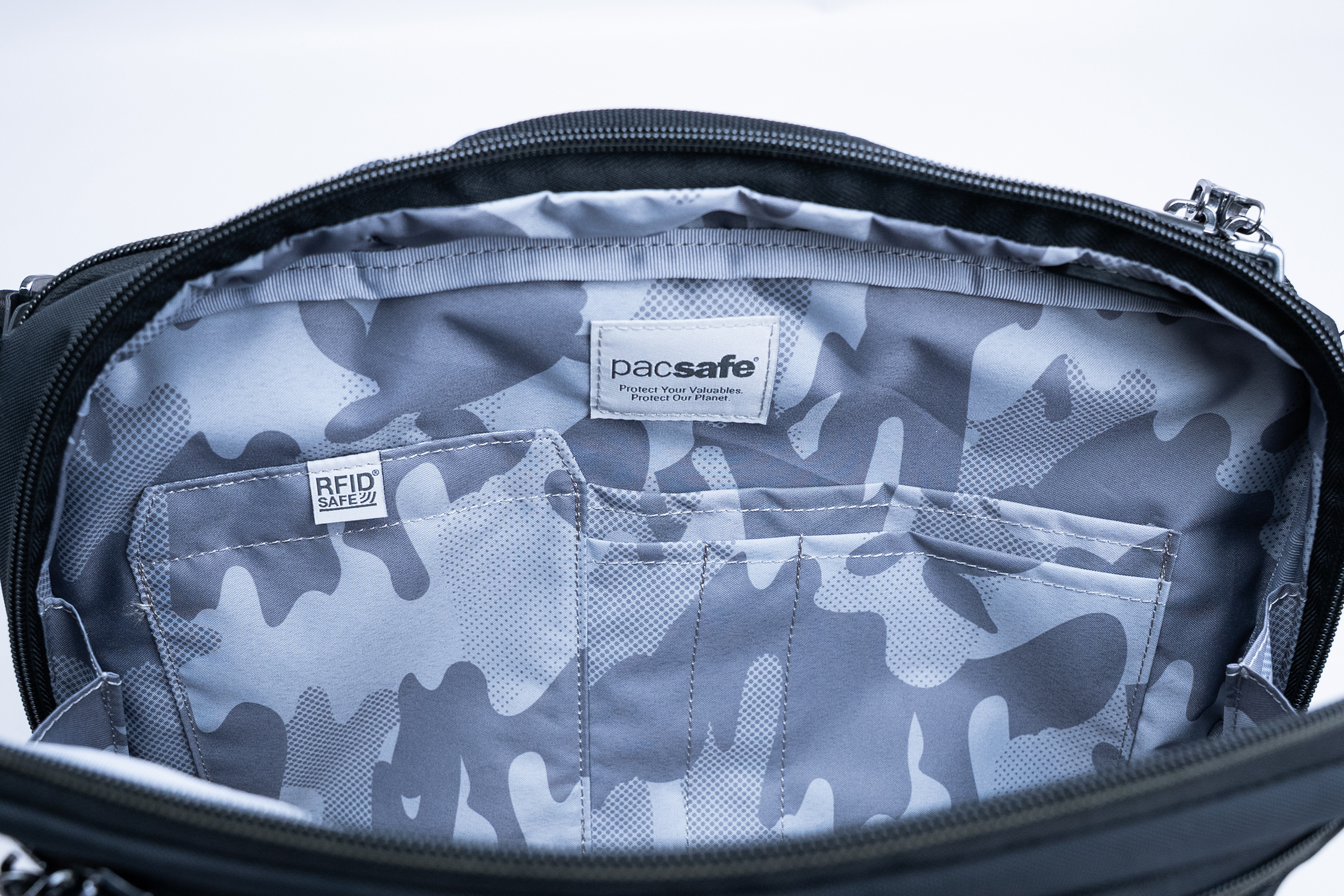 Pacsafe EXP 12″ anti theft sling crossbody RFID Pocket