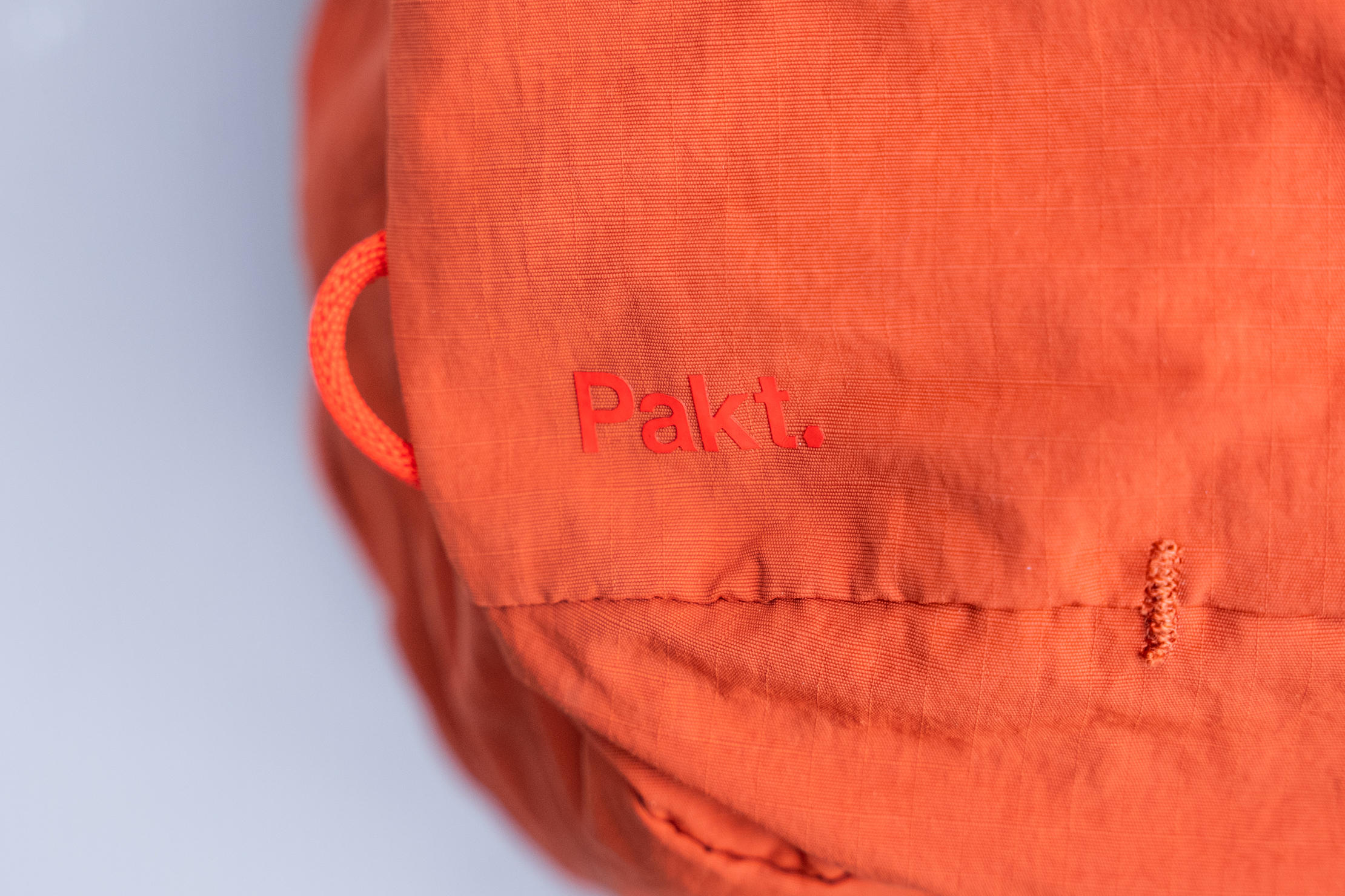 Pakt Stash Packable Backpack 16L Orange Logo