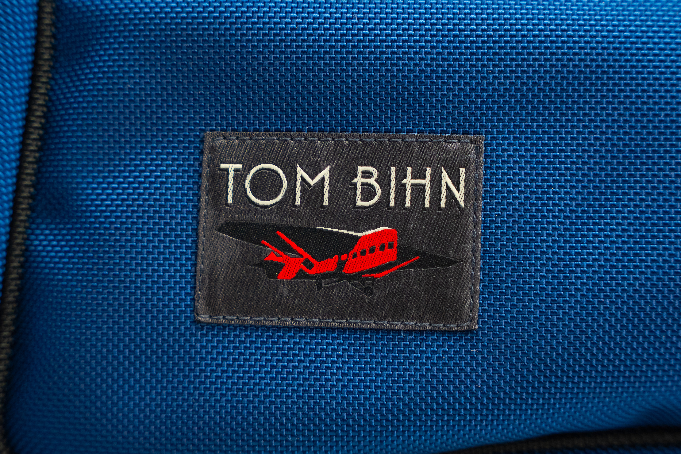 TOM BIHN Tri-Star Logo