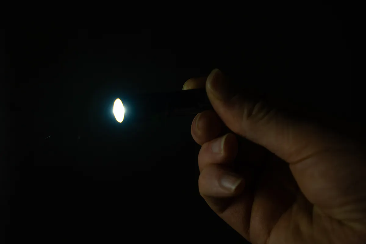 OLIGHT i3E EOS Keychain Flashlight On