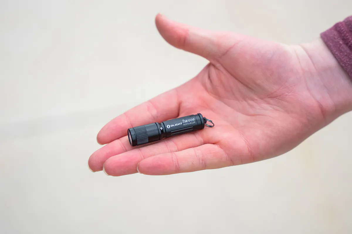OLIGHT i3E EOS Keychain Flashlight Palm