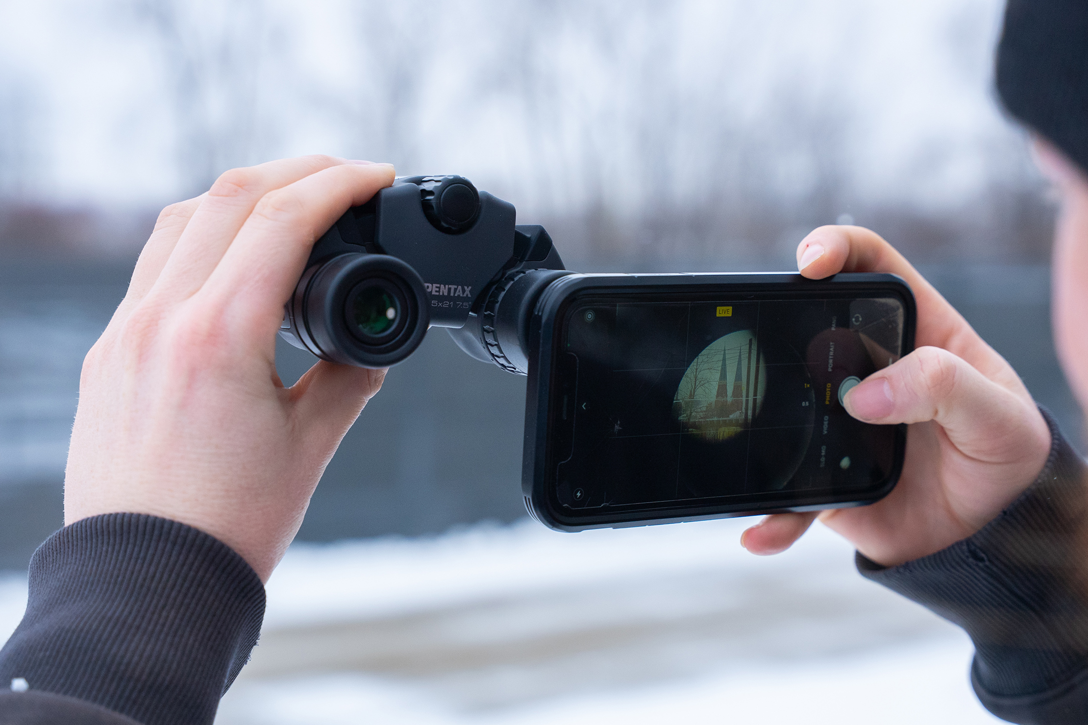 Using a phone through binoculars