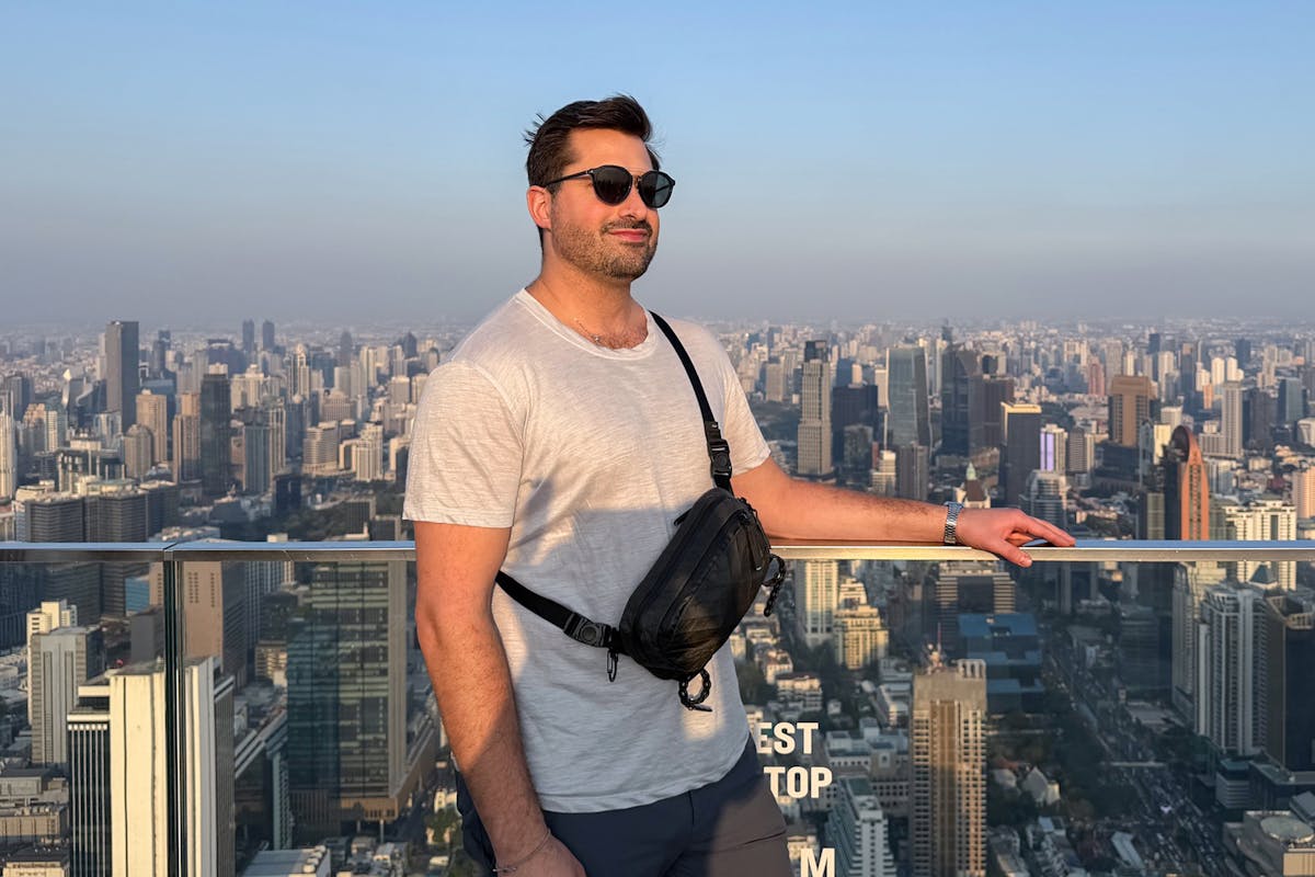 Wearing the Pack Hacker x Aer Ultra Sling on a rooftop in Bangkok, Thailand