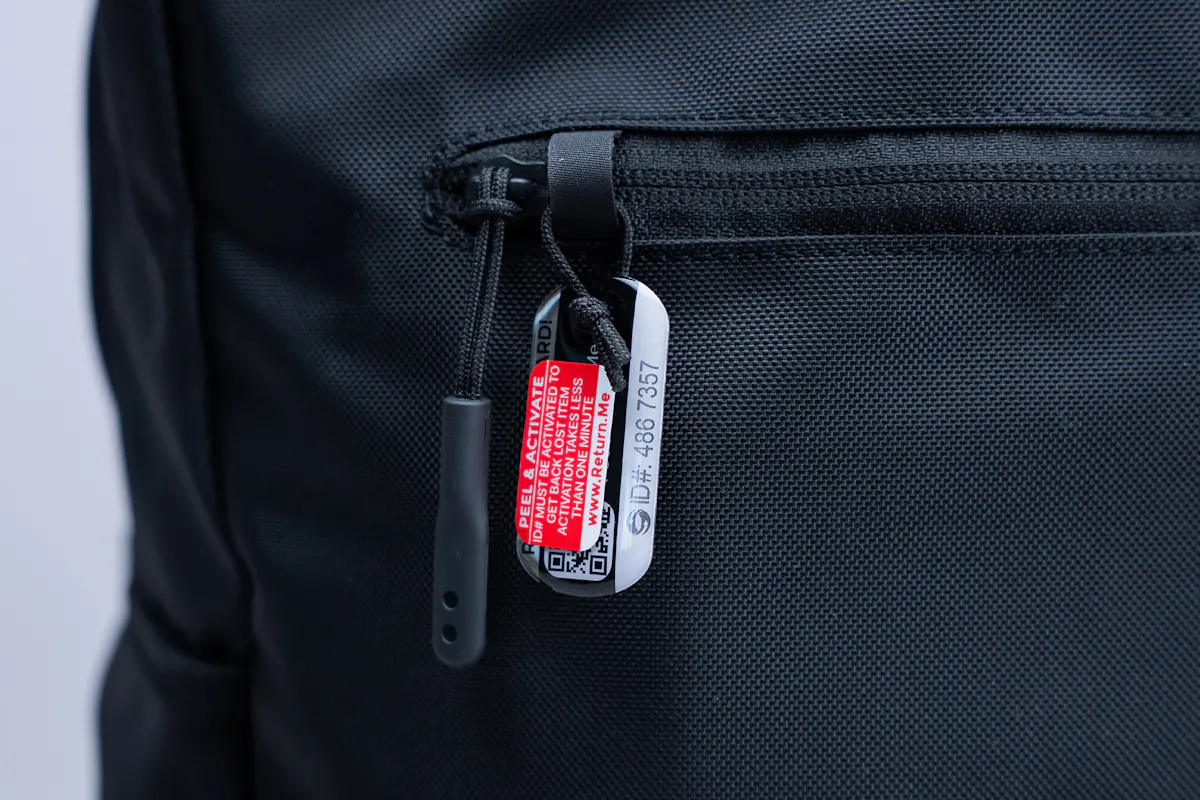Sherpani Sojourn Tote Pack Top Pocket Tag