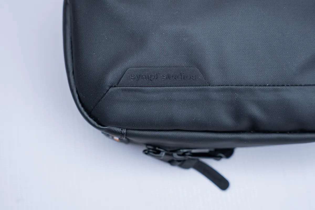 Sympl Phone Sling 1.5L Side Brand