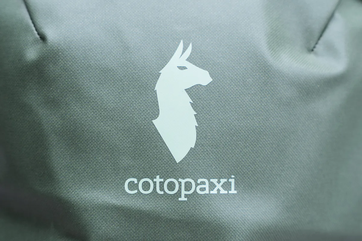 Cotopaxi Allpa Mini 20L Travel Pack Logo