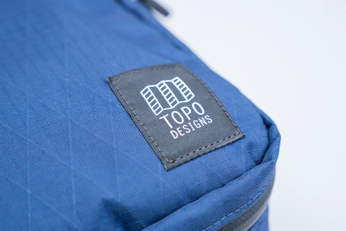 Topo Designs Global Pro Tech Case Logo