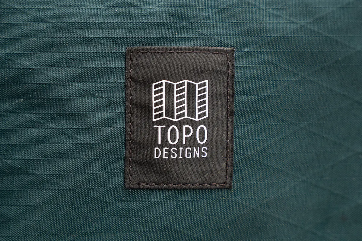 Topo Designs Global Pro 3-Way Briefcase Logo