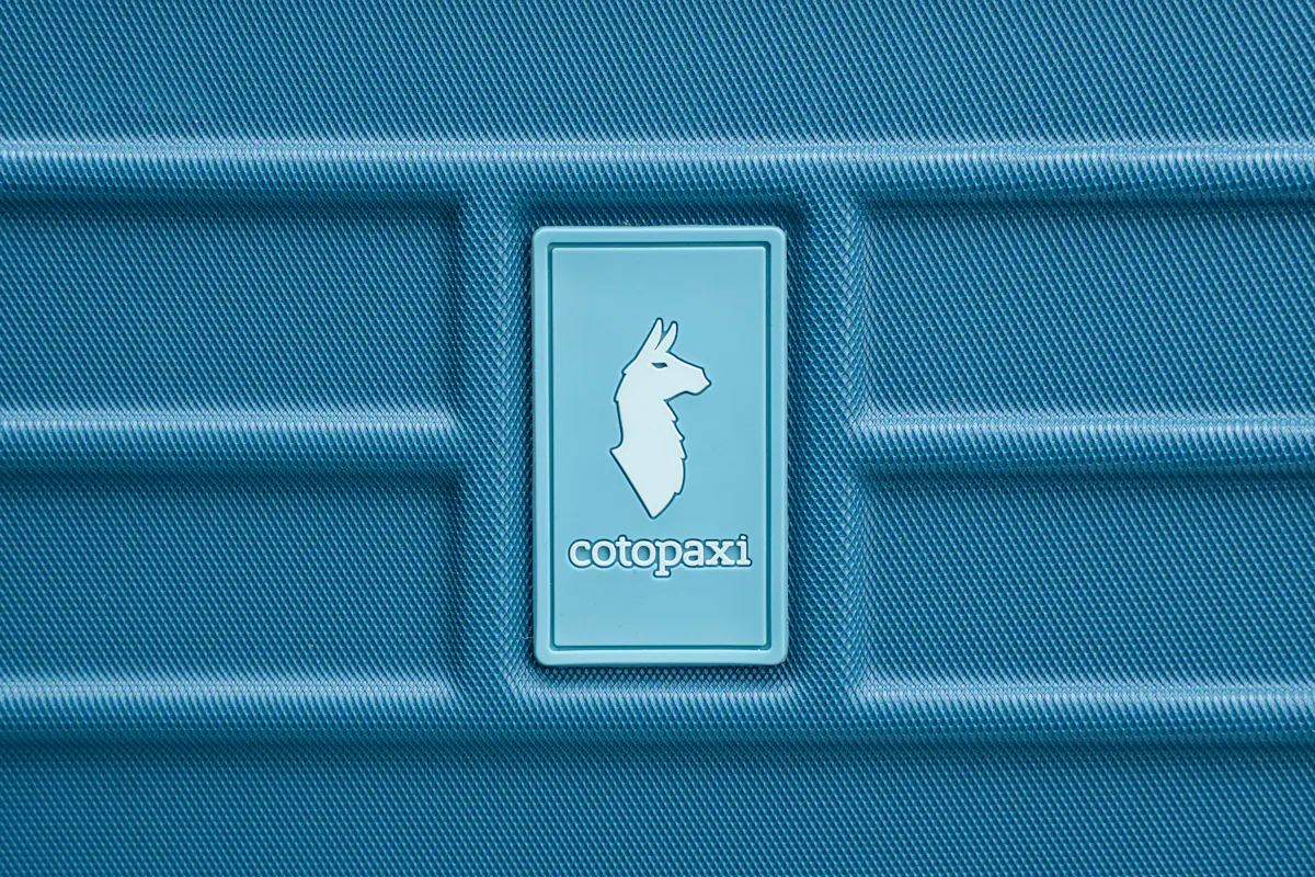 Cotopaxi Coraza Carry-On Logo
