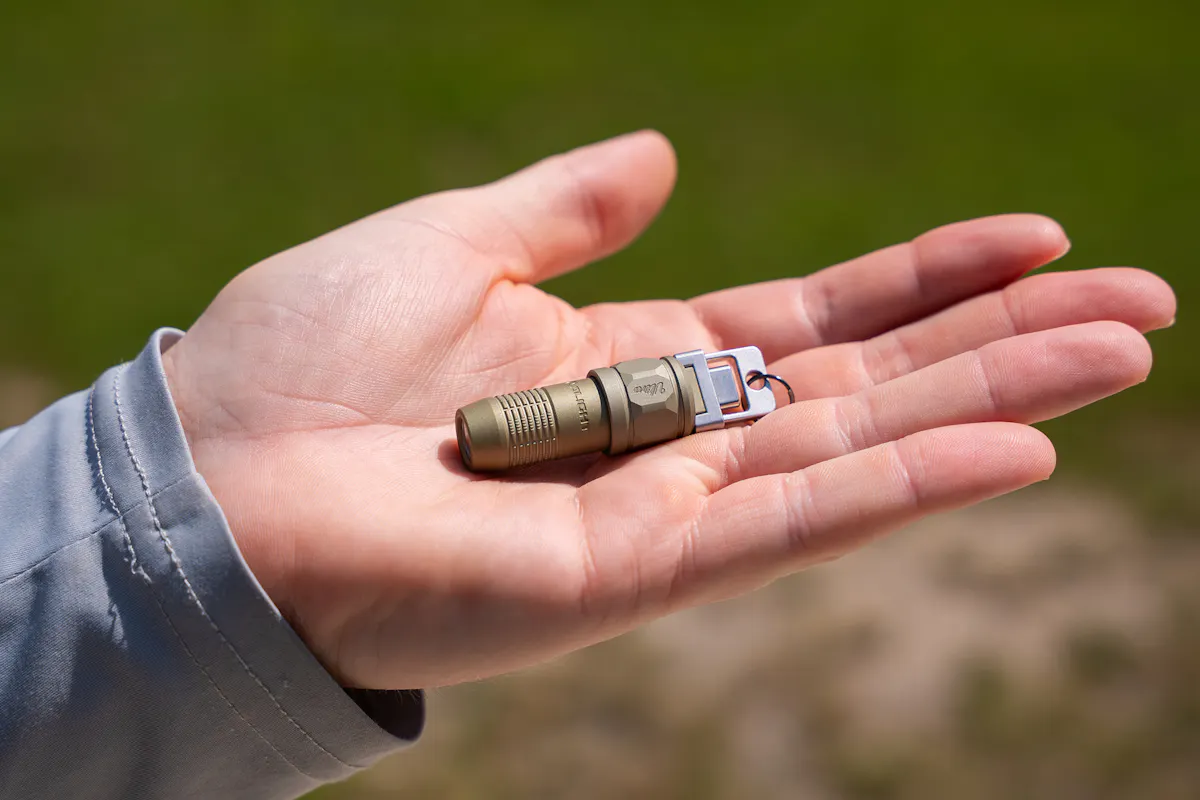 Olight iUltra OAL Keychain Flashlight Palm