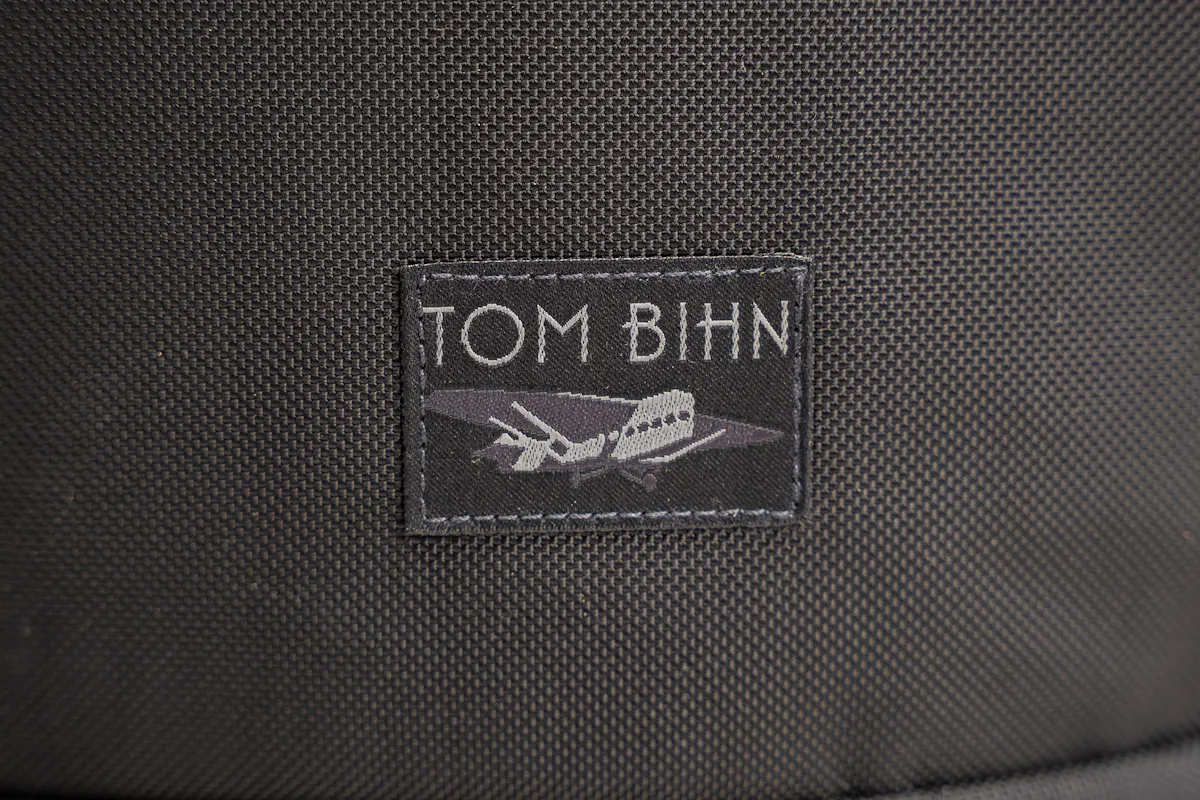 TOM BIHN Adept Roll-Top Backpack Brand